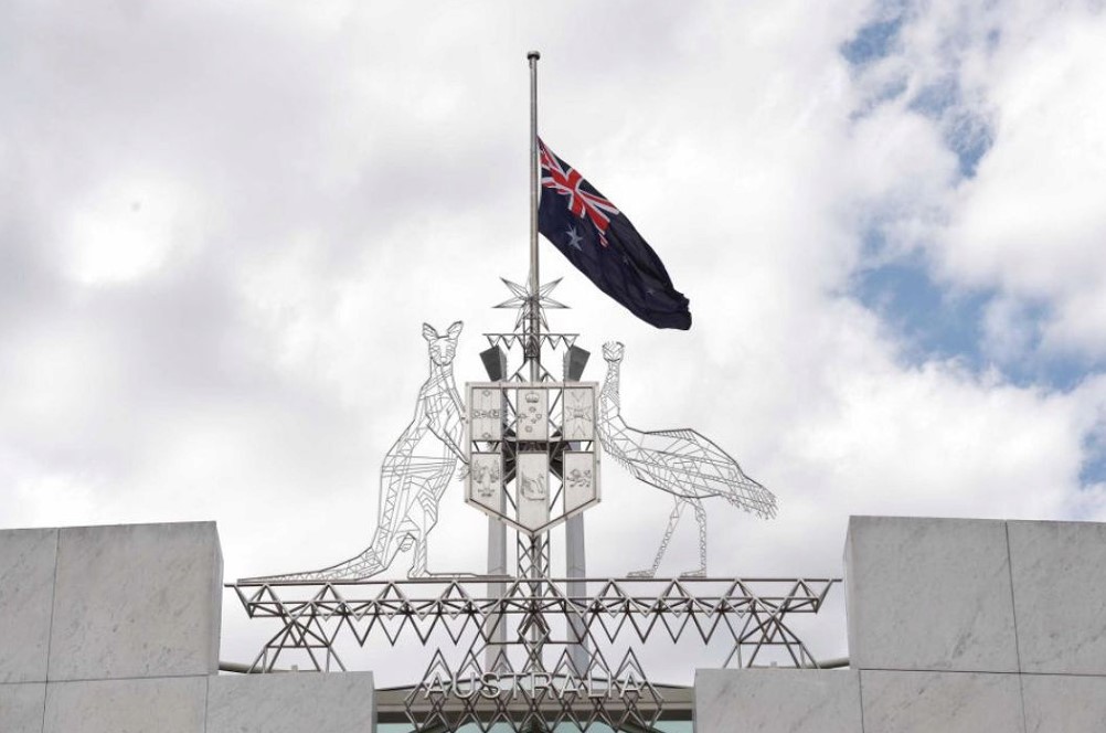 Flying the Australian National Flag a Half mast over Parliamant House in Canberra